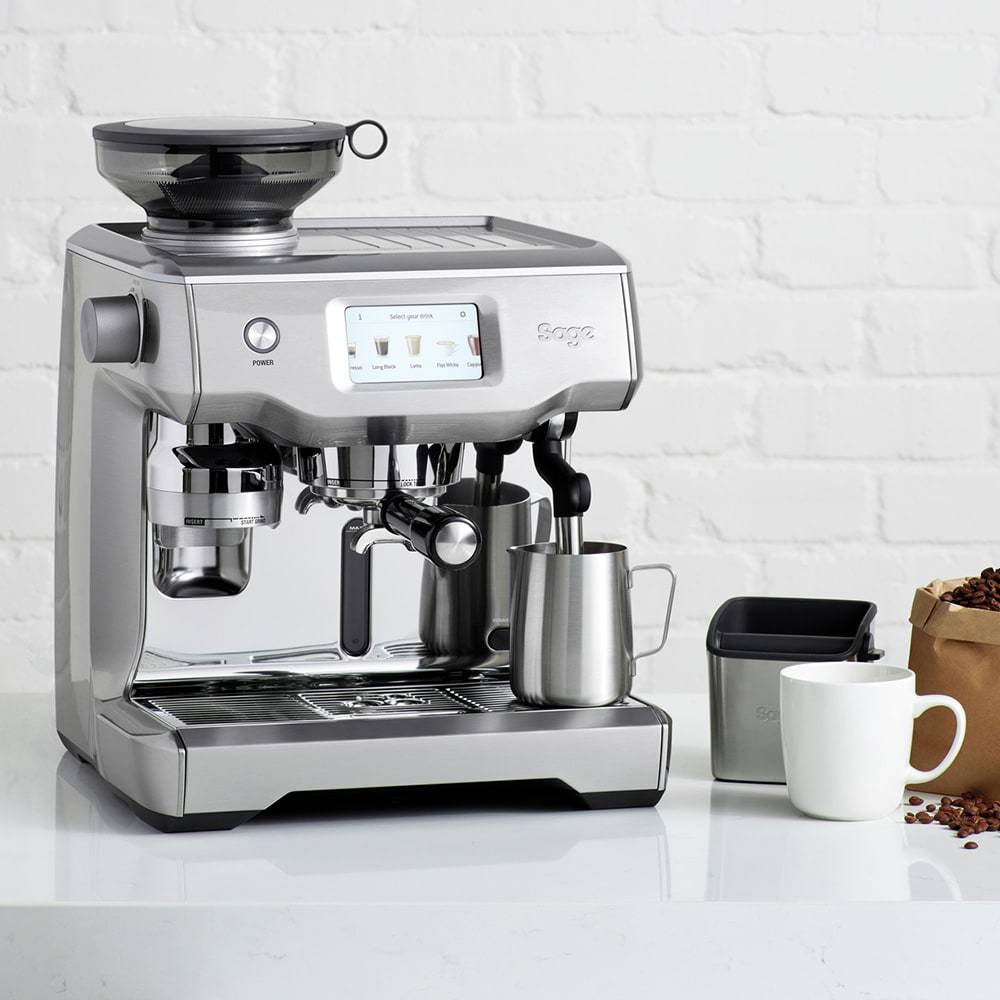 Close-up of the dual boilers and steam wand on the Sage Oracle Touch.