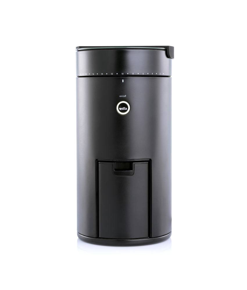 Perfectly Brewed Coffee - A close-up of freshly brewed coffee in a cup with the Wilfa coffee maker in the background.