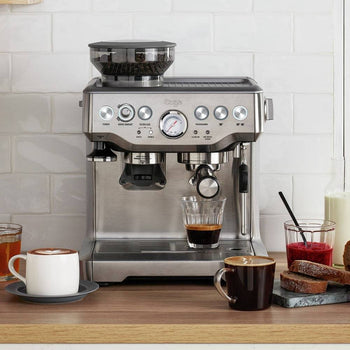 Side view of the Sage Barista Express Espresso Machine’s compact design in stainless steel.