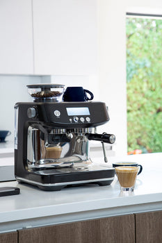 Side view showcasing the sleek design of Sage Barista Pro in Black Truffle finish.