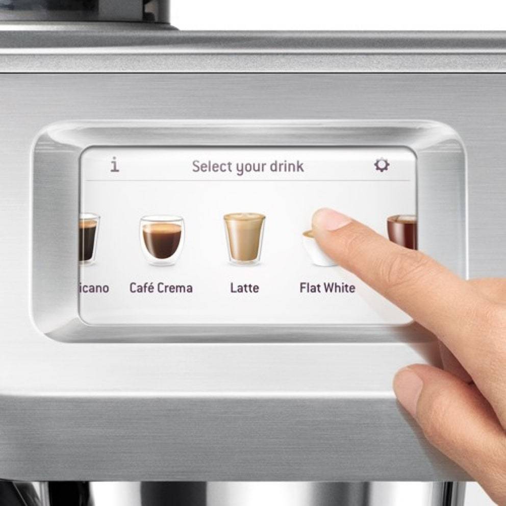 Side view showing the brushed stainless steel exterior of the Oracle Touch