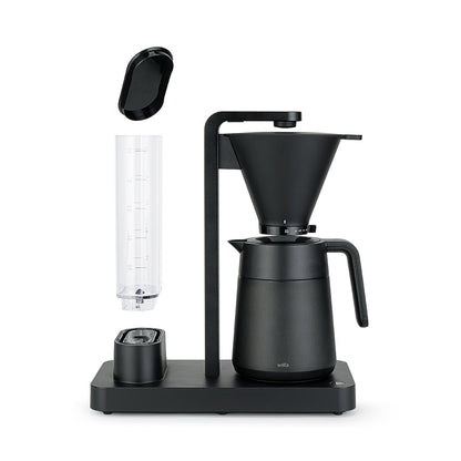 Brewing Coffee - Fresh coffee brewing process with adjustable drip stop feature.