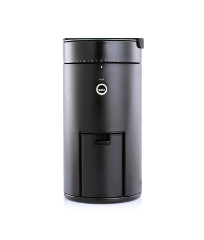 Perfectly Brewed Coffee - A close-up of freshly brewed coffee in a cup with the Wilfa coffee maker in the background.